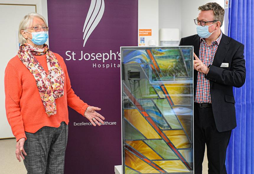 stuart-hammond-ceo-presents-historic-stained-glass-window-to-sister-bernadette.jpg